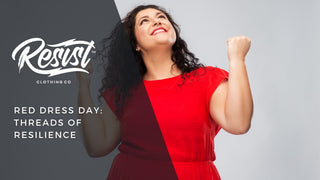 Woman in red dress with fists raised in excitement.