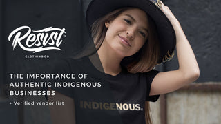 Indigenous person wearing a shirt that says "Indigenous"
